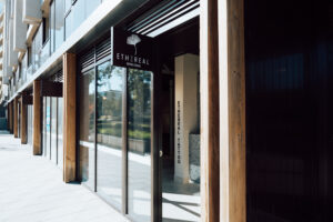 Industrial tattoo studio fitout in Canberra featuring exposed concrete, raw materials, and urban styling.