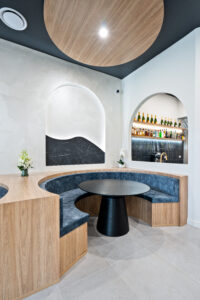 Classy jewellery retail interiors in Canberra with arches, timber finishes, and elegant lighting.