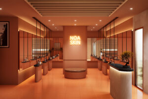Melbourne skin clinic fitout with warm terracotta tones, soft lighting, and modern wellness interiors.